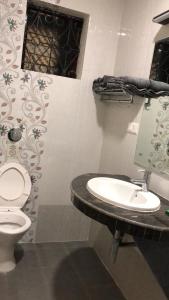 Phòng tắm tại John's Highland Comfort (Guest House)