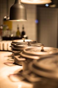 a row of drums sitting on top of a counter at Comfort Hotel Trondheim in Trondheim