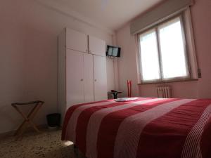 Postel nebo postele na pokoji v ubytování Gardenia Guest House