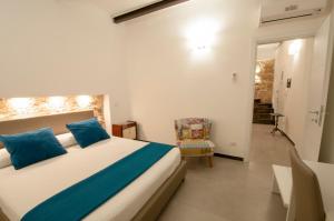Katil atau katil-katil dalam bilik di Santa Chiara - Il Milese