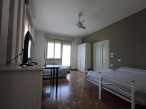 Postel nebo postele na pokoji v ubytování Gardenia Guest House