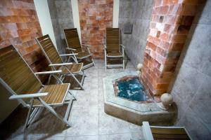 A seating area at AquaSun Family Hotel