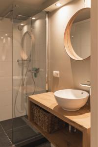 Koupelna v ubytování Vakantie-appartement Oppe Donck met sauna
