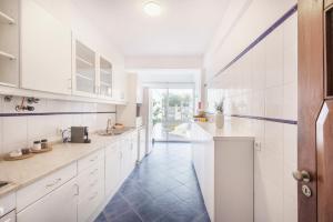 Kuchyň nebo kuchyňský kout v ubytování We Apartment by Olala Homes + 17 fotografií