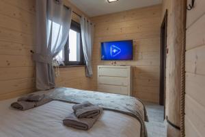 Posteľ alebo postele v izbe v ubytovaní Zrúboček / Log Cabin