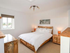 Postel nebo postele na pokoji v ubytování Fairfield Cottage