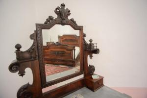 A bed or beds in a room at Palazzo Introna