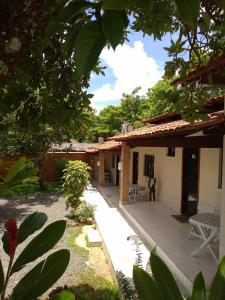 a view of a house with a patio at Suites do Ratinho in Pirenópolis