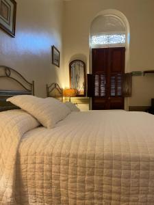 Postel nebo postele na pokoji v ubytování Boutique Hotel Belgica