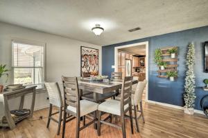 a dining room with a table and chairs at Brenham Bungalow with Yard, 1 Mi to Downtown! in Brenham