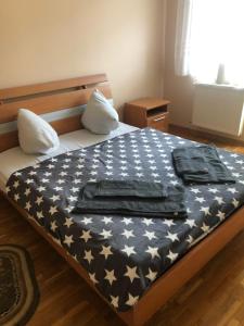 Postel nebo postele na pokoji v ubytování Tur Gotel Kosiv