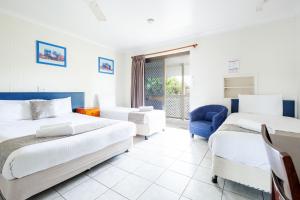 Postel nebo postele na pokoji v ubytování Motel Ingham