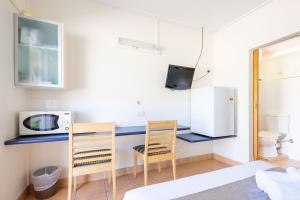 Kuchyň nebo kuchyňský kout v ubytování Motel Ingham