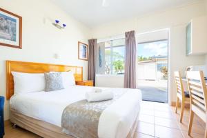 Postel nebo postele na pokoji v ubytování Motel Ingham