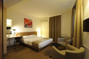Voodi või voodid majutusasutuse Kardes Hotel toas