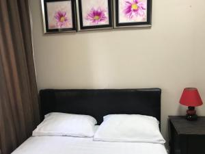 Säng eller sängar i ett rum på Valencia Mini Hotel