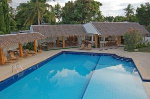 Swimmingpoolen hos eller tæt på Marcosas Cottages Resort