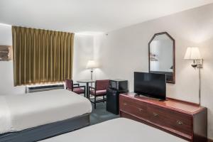 Krevet ili kreveti u jedinici u okviru objekta Americas Best Value Inn-Wenona