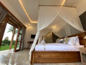 Кровать или кровати в номере Luxury Villa Ada Padi Ubud one bed room