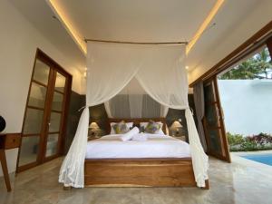 Кровать или кровати в номере Luxury Villa Ada Padi Ubud one bed room