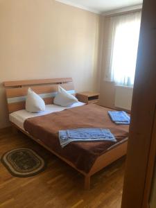 Postel nebo postele na pokoji v ubytování Tur Gotel Kosiv
