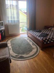 Postel nebo postele na pokoji v ubytování Tur Gotel Kosiv