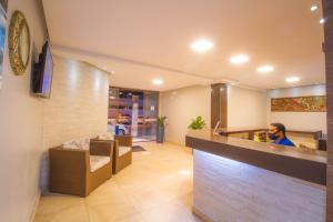 Uma área de estar em Hotel Bem Brasil