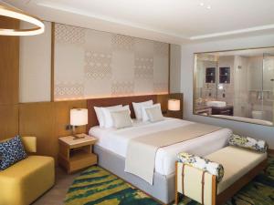 Postel nebo postele na pokoji v ubytování Mövenpick Resort Cam Ranh