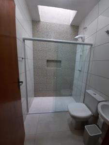 Ένα μπάνιο στο Casa férias Itapoá