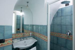Koupelna v ubytování Hotel La Ninfa