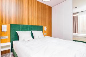 Posteľ alebo postele v izbe v ubytovaní Boogie Apartments