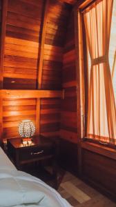 Postel nebo postele na pokoji v ubytování Lumbung Temu Homestay