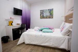 Ένα ή περισσότερα κρεβάτια σε δωμάτιο στο B&B LA CHICCA