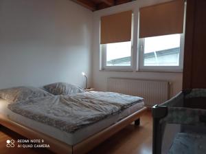 Voodi või voodid majutusasutuse Heubüschl toas
