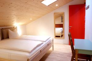 Posteľ alebo postele v izbe v ubytovaní Apartment Luam - Alpstay + 12 fotografií