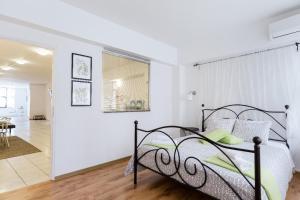Posteľ alebo postele v izbe v ubytovaní Driopon Apartment - Penthouse