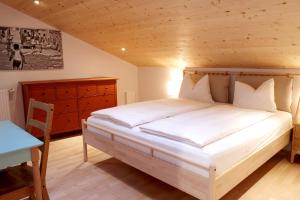 Posteľ alebo postele v izbe v ubytovaní Apartment Luam - Alpstay
