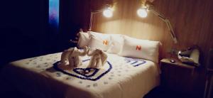 Katil atau katil-katil dalam bilik di Hotel Nomada