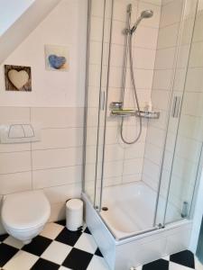 Koupelna v ubytování Hofgut Wollin GmbH