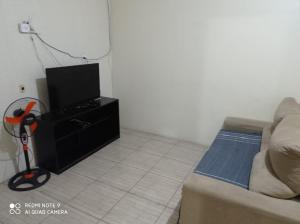 Μια τηλεόραση ή/και κέντρο ψυχαγωγίας στο CASA COM PISCINA sensacional