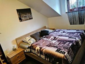Llit o llits en una habitació de Penzion U Jana