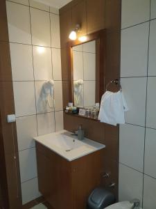Koupelna v ubytování Hotel Tara + 27 fotografií
