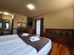 Postel nebo postele na pokoji v ubytování Hotel Tara