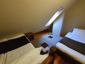 Postel nebo postele na pokoji v ubytování Hotel Tara