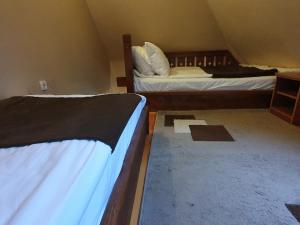 Postel nebo postele na pokoji v ubytování Hotel Tara