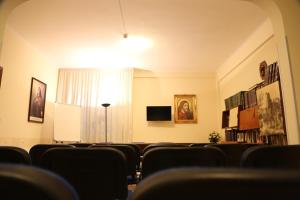 TV a/nebo společenská místnost v ubytování Casa Piccole Ancelle di Cristo Re