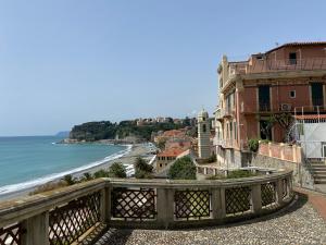 a view of the ocean from a balcony at Suite 5 stelle nel Borgo di Celle Ligure in Celle Ligure