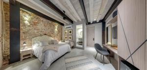Postel nebo postele na pokoji v ubytování Lunalá Hotel Boutique