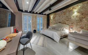 Postel nebo postele na pokoji v ubytování Lunalá Hotel Boutique