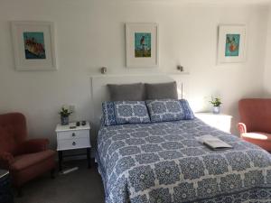 Postel nebo postele na pokoji v ubytování Pa Road B&B Kerikeri NZ